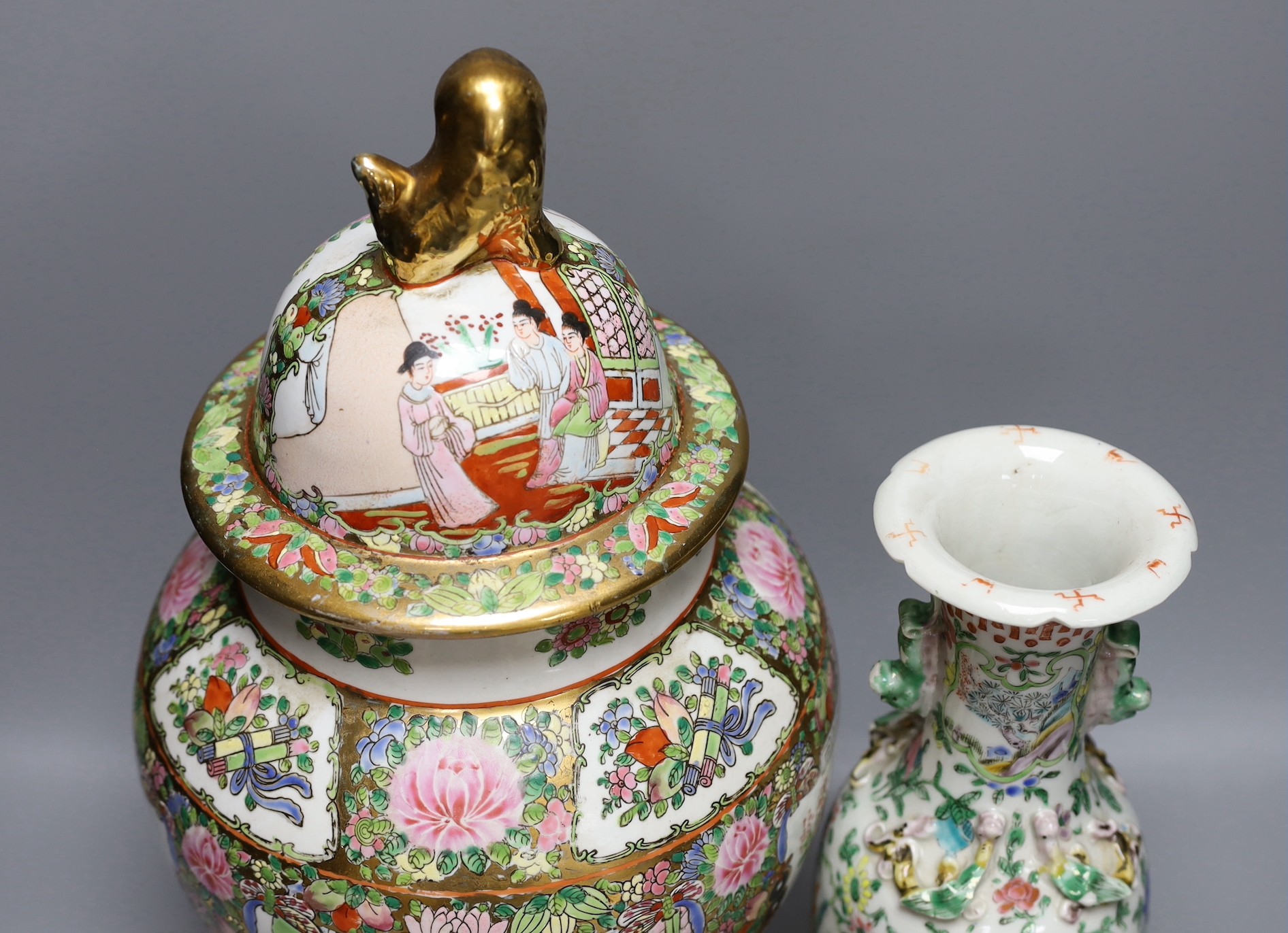 A 19th century Chinese famille rose vase and a later jar and cover, 19th century vase 30 cms high